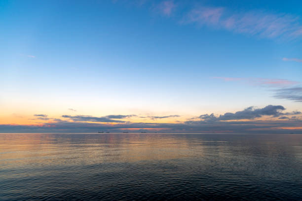 istock the setting sun in Gdynia behind the sea horizon 1446462648