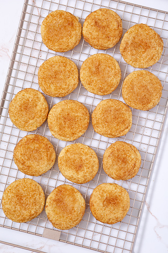 High angle view of homemade snickerdoodle cookies on a cooling rack