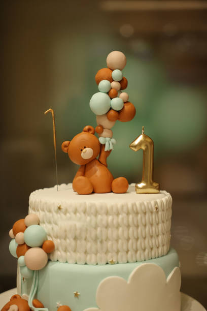 First birthday cake with bears and candle without people