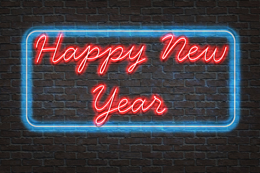 Happy New Year lettering on brick wall for background