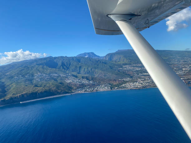 istock Flying over Reunion island in ultra light plane 1446466323