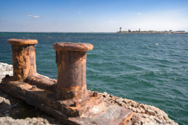 Lighthouse and old pier on Donuzlav lake. Crimea stock photo