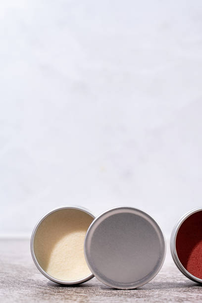 istock colorful lip balms in round tin cases , mockup design 1446474095
