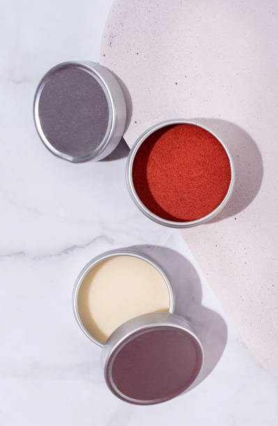 istock colorful lip balms in round tin cases with shadow overlay, mockup design 1446478324