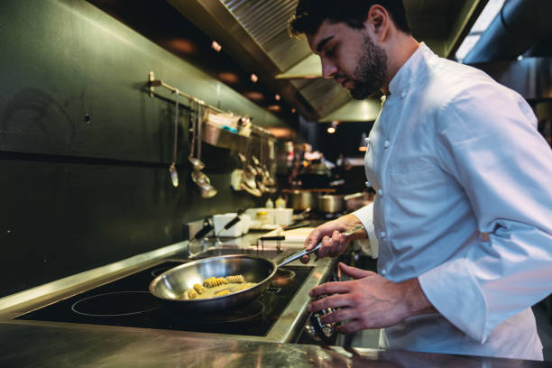 istock A chef is preparing pasta in the restaurant's kitchen 1446478706
