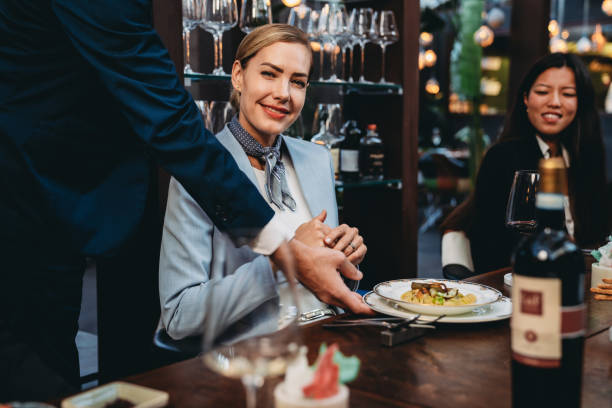 istock A waiter is serving food in an high-end restaurant 1446478915