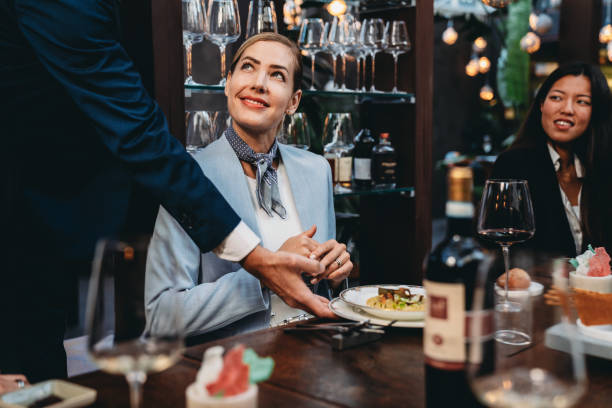 istock A waiter is serving food in an high-end restaurant 1446478917