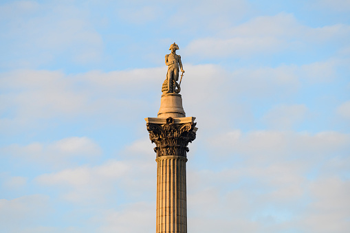 High section view in afternoon light of London monument constructed in 1840s to commemorate Vice-Admiral Horatio Nelson’s victory at the Battle of Trafalgar.