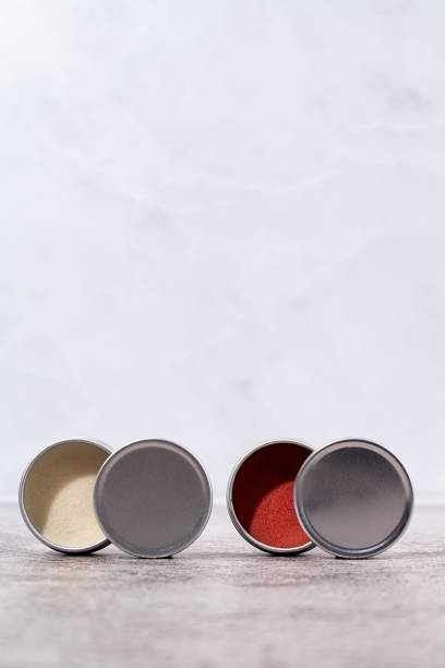 istock colorful lip balms in round tin cases , mockup design 1446479613