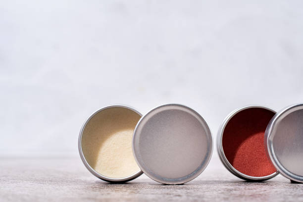 istock colorful lip balms in round tin cases , mockup design 1446479702