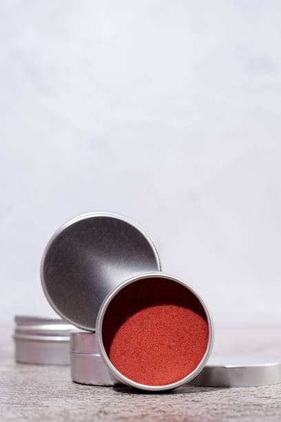 istock colorful lip balms in round tin cases , mockup design 1446480293