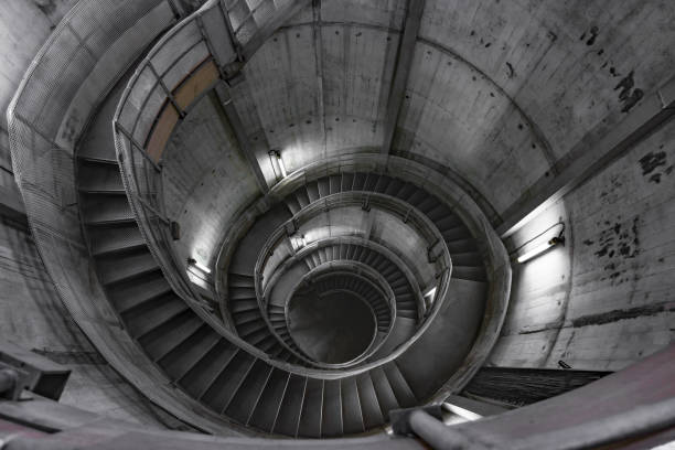 istock Building with a long spiral staircase 1446480392