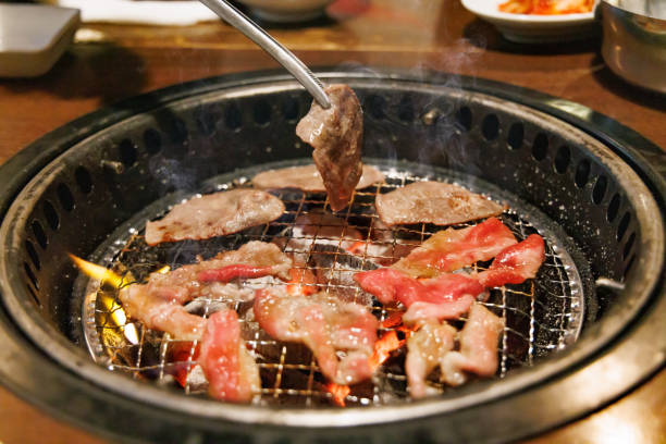 istock Delicious meat dish grilled on charcoal 1446480617