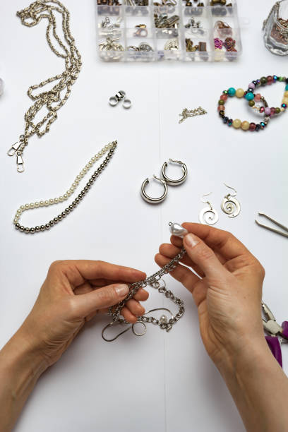 istock The designer makes handmade jewelry at the workplace. 1446480712