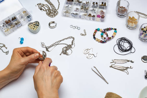istock The designer makes handmade jewelry at the workplace. 1446480729