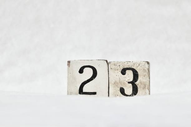 istock 23 number calendar date, white winter background copy space 1446481634