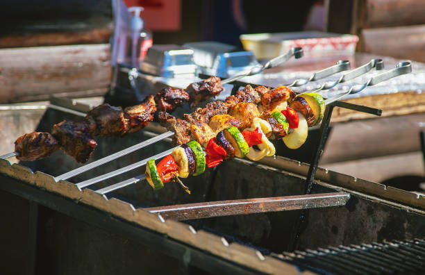 istock Barbecue and grilled vegetables are fried on the grill. Selective focus. 1446483162