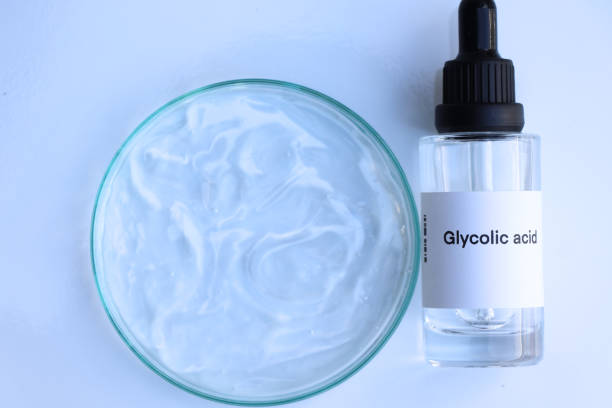 Glycolic acid in a bottle, chemical ingredient in beauty product Glycolic acid in a bottle, chemical ingredient in beauty product, skin care products acid stock pictures, royalty-free photos & images
