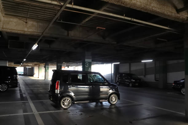 istock Dimly lit and scary even during the day, multi-level parking lot 1446488396