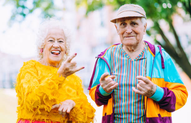 istock old modern couple dressing fashionable colored clothes 1446488433