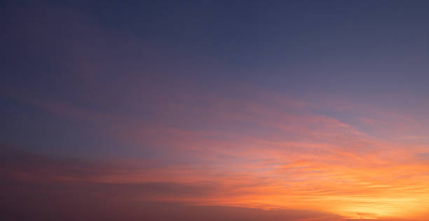 istock Sunset sky. Abstract nature background. Dramatic blue with orange colorful clouds in twilight time. 1446493592