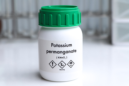 potassium permanganate in glass, chemical in the laboratory and industry, Chemicals used in the analysis or raw materials for production