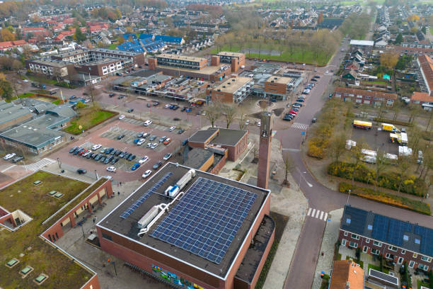 Biddinghuizen Flevoland church by drone This photo is taken by a drone. It shows the city center of Biddinghuizen, a small city in Flevoland. You can see the center, a small market on the square and the church. biddinghuizen stock pictures, royalty-free photos & images