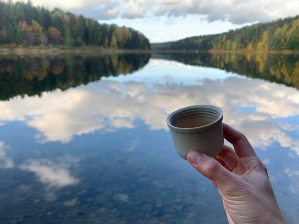 istock Person hold a cup with hot tea 1446495023