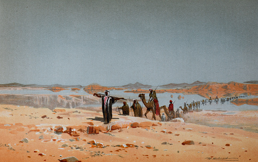 Desert walk poster. Camel caravan in desert at sunset. vintage hand drawn engraved illustration. retro desert poster or wallpaper.