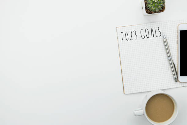 istock Notebook with 2023 goals text on it to apply new year resolutions and plan. 1446495742
