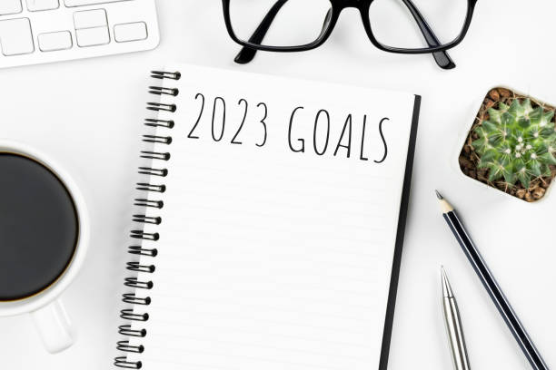 istock Notebook with 2023 goals text on it to apply new year resolutions and plan. 1446495767