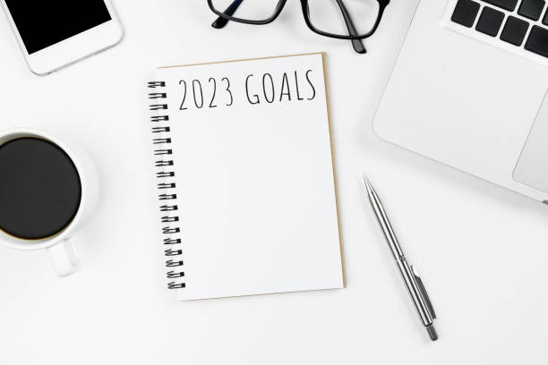 istock Notebook with 2023 goals text on it to apply new year resolutions and plan. 1446495771