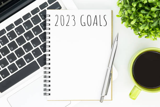 istock Notebook with 2023 goals text on it to apply new year resolutions and plan. 1446495772