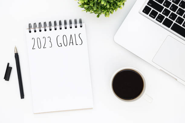 istock Notebook with 2023 goals text on it to apply new year resolutions and plan. 1446495783