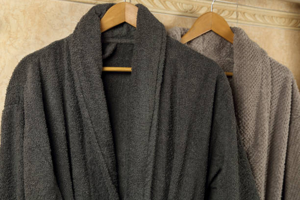 istock grey bathrobes in the bathroom 1446502020