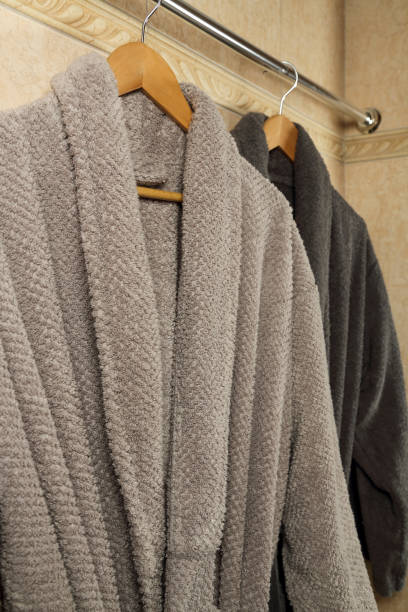 istock grey bathrobes in the bathroom 1446502045