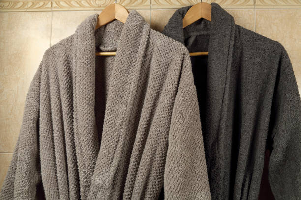 istock grey bathrobes in the bathroom 1446502079