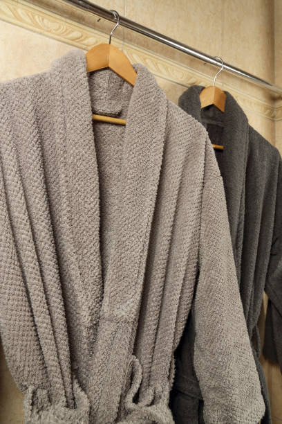 istock grey bathrobes in the bathroom 1446502189