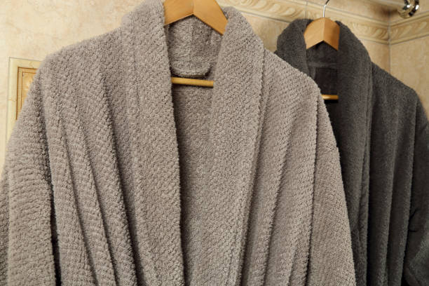 istock grey bathrobes in the bathroom 1446502227