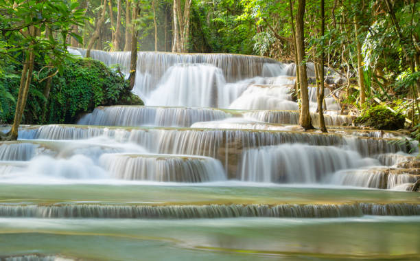 Erawan Waterfall. Nature landscape of Kanchanaburi district in natural area. it is located in Thailand for travel trip on holiday and vacation background, tourist attraction. Erawan Waterfall. Nature landscape of Kanchanaburi district in natural area. it is located in Thailand for travel trip on holiday and vacation background, tourist attraction. kanchanaburi province stock pictures, royalty-free photos & images