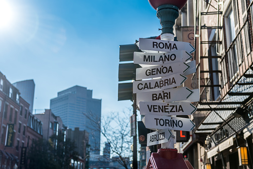 Boston, MA, USA - Nov 23, 2022: Nice signage of the main Italian cities in a corner of the Italian neighborhood of North End, in Boston. The North End, Boston’s Little Italy, is a maze of narrow streets with some of the city’s oldest buildings. On the self-guided Freedom Trail, tourists pass historic sites like the 1680 Paul Revere House and the Old North Church, which played a key role at the beginning of the Revolutionary War. Italian restaurants, coffeehouses, pastry shops, and old-school delis pack the area, especially on lively Hanover Street.