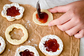Traditional Linzer Christmas cookies filled with jam. home baking idea