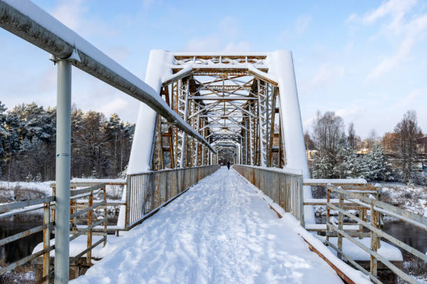 istock sunny winter landscape with iron construction bridge, Valmiera 1446506816