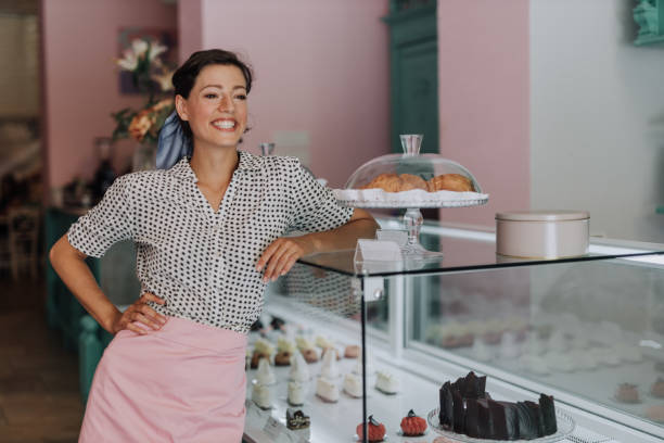 istock Bakery owner standing next to the refrigerator 1446508382