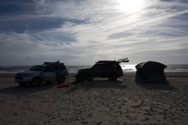 istock Backlit overlanding campsite at the beach 1446508414