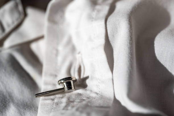 istock button extender shown on a white dress shirt to increase size 1446508642
