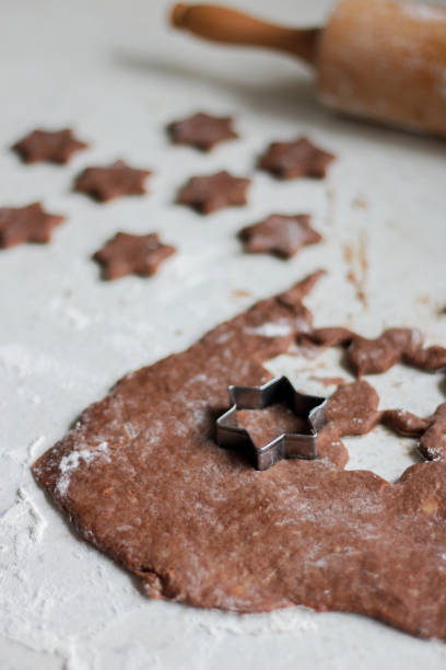 istock Baking Christmas cookies in the kitchen close up 1446511018