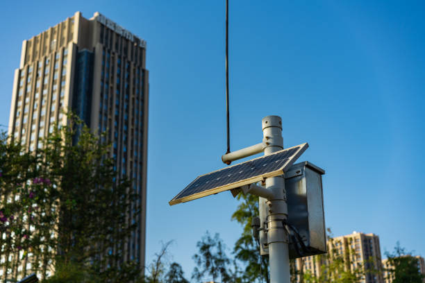 istock Surveillance system powered by solar panels in a city park 1446515530