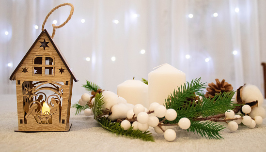 Christmas. Wooden crib with lights background