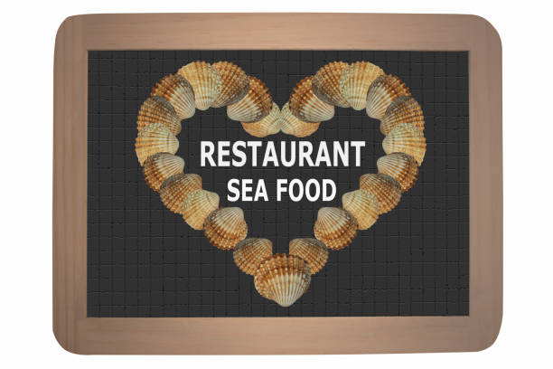 Seafood restaurant  Heart on a slate formed from seashells
